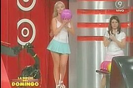 Hot little blonde makes upskirt (fake) magic bowling