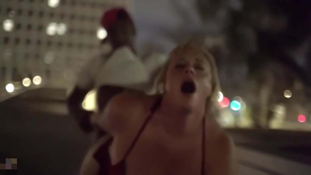 Her full breasts beckoning